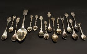 A 19th Century Silver Tablespoon Together with a collection of souvenir spoons - various designs,