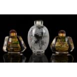 A Collection Of Three Oriental Glass Snuff Bottles All with painted decoration,