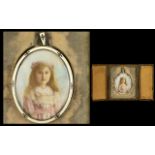 A Late Victorian/Edwardian Portrait Miniature Depicting a young girl painted on ivory,