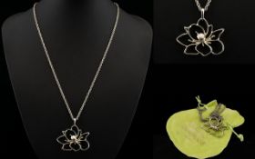 Vivienne Westwood Pendant Necklace White metal flower pendant with attached chain,