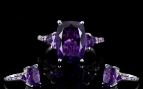 Amethyst Cushion and Trillion Cut Ring, a 6ct elongated cushion cut, regal purple amethyst, set with