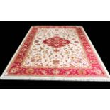 A Very Large Woven Silk Carpet Keshan rug with beige ground and traditional Middle Eastern floral