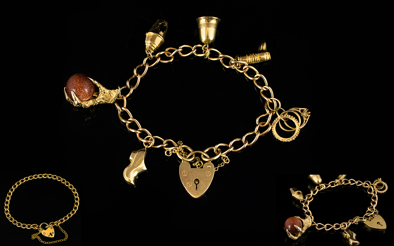 9ct Gold Bracelet Loaded with 6 x 9ct Gold Charms.