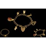 9ct Gold Bracelet Loaded with 6 x 9ct Gold Charms.