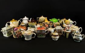 A Collection Of Novelty Decorative Tea Pots to include x2 'a day at the races' sadler tea pots,