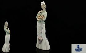 Lladro Porcelain Ballerina Figure 'Walk with Dog', model no 4893. Issued 1974 - retired. Height 14.