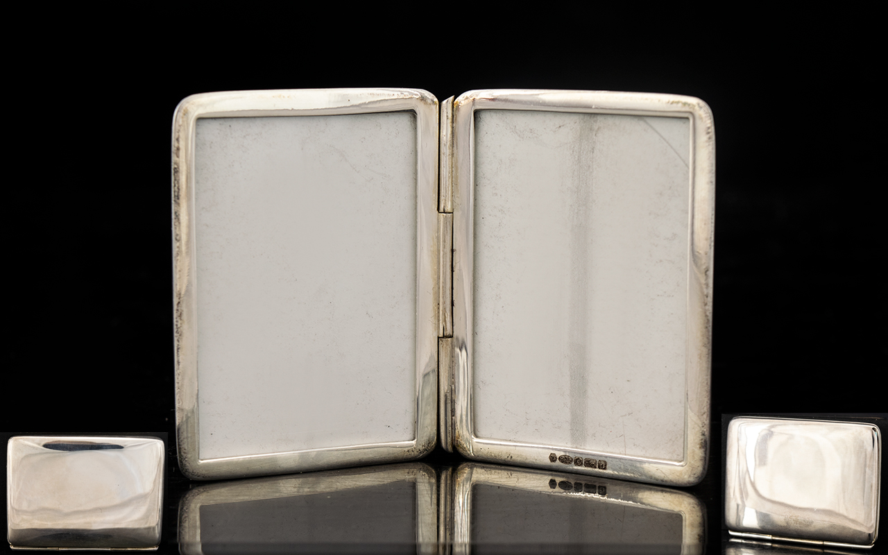 Silver Pocket Double Photo Frame Fully hallmarked, plain square, hinged case, 2 inches in height.