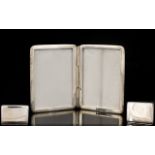Silver Pocket Double Photo Frame Fully hallmarked, plain square, hinged case, 2 inches in height.