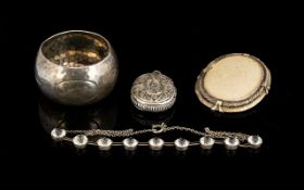 A Mixed Lot Of Silver Comprising paste set silver necklace, wirework locket of ovoid form,