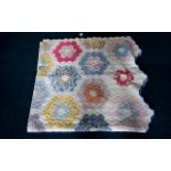 Early 20th Century American Patchwork Quilt Polychrome pieced quilt in hexagonal floral design with