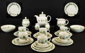 Royal Doulton 'Expressions' Tea Service in fine china to include 6 cups, 6 saucers, 6 side plates, 6