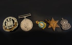 Military Interest A Small Collection Of Medals And Badges To include 1939 - 1945 replica defence