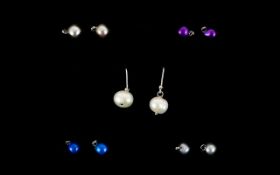 Set of Five Pairs of Interchangeable Fresh Water Pearl Earrings, the set comprising a pair of silver