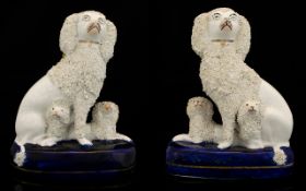 Staffordshire - Mid 19th Century Fine Pair of Seated Poodles with Pups,