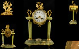 French - Late 19th Century Empire Style H.B. Choisy Le Roi Gilt Metal and Alabaster 8 Day Striking