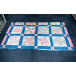 A Late 19th Century American Northumberland Patchwork Quilt Hand stitched in polychrome cotton with