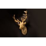 Contemporary Gilt Resin Wall Mounted Stags Head Statement wall hanging in the form of a hunting