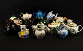 A Collection Of Novelty Decorative Tea Pots to include P&K Christmas pudding tea pot,