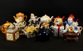 A Collection Of Novelty Decorative Tea Pots to include Price Kensington red telephone box tea pot,