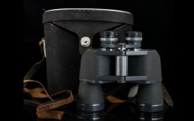 Simor 10 x 50 Binoculars Serial number 340286 In original leather carry case with shoulder strap.