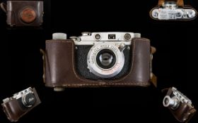 A Leica IIIA Camera Serial Number 309517 K Fitted with a Leitz Elmar 1.35 F 35mm lens.