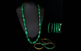 A Collection Of Malachite And Mixed Metal Jewellery Eleven items in total to include polished