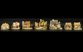 A Collection Of Seven Fraser Creations Modeled Cottages.