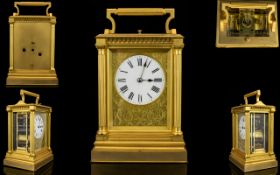 French 19thC Petite Sonnerie Gilt Metal Repeating Carriage Clock of large proportions,