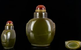 Oriental Agate Snuff Bottle Hardstone bottle of typical form with carnelian cabochon to top and