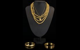 A Small Collection Of Gold Tone Costume Jewellery Items Three items in total to include 1970's four