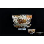Antique Oriental Tea Bowl And Saucer decorated in under glazed blue depicting flying cranes,
