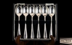 A Cased Set Of Silver Teaspoons Hallmarked Birmingham F 1930