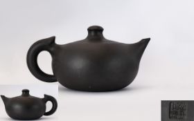 Chinese Republic Yixing Teapot Of plain form with squat body and character marks for GeTaoZhong.