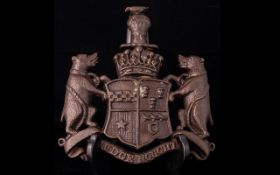 Antique Cast Armorial Crest Having Chained Bears Holding A Shield With The Motto 'JUDGE NOUGHT'