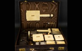 Art Deco Twelve Piece Travelling Vanity Set Each with gilt silver collars, hallmarked London 1941