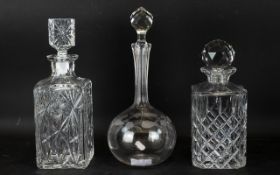 Three Attractive Glass Decanters. Tallest Twelve Inches. All With Star burst Designs To Bottom.
