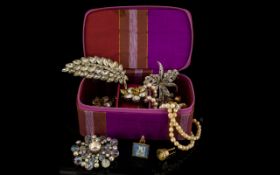 A Small Collection Of Mid 20th Century Paste Set Costume Jewellery Housed in zip around pink