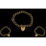 9ct Gold and Bracelet with Attached Heart Shaped Padlock and Safety Chain.