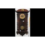 Early 20th Century Vienna Style Wall Clock Brass pendulum, walnut case, Roman numerals,