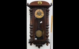 Early 20th Century Vienna Style Wall Clock Brass pendulum, walnut case, Roman numerals,