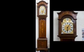 Edwardian Mahogany Long Case Clock Gilt arched dial, silvered chapter dial with Roman numerals,