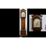 Edwardian Mahogany Long Case Clock Gilt arched dial, silvered chapter dial with Roman numerals,