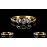 18ct Gold & Platinum Set 3 Stone Diamond Ring of Attractive Form.