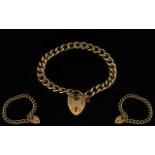 9ct Gold Curb Bracelet with Heart Shaped Padlock and Safety Chain. Fully Hallmarked for 9.375 Gold.