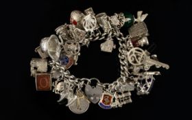 1960's Good Quality Silver Curb Bracelet - Loaded with over 38 Silver Charms,