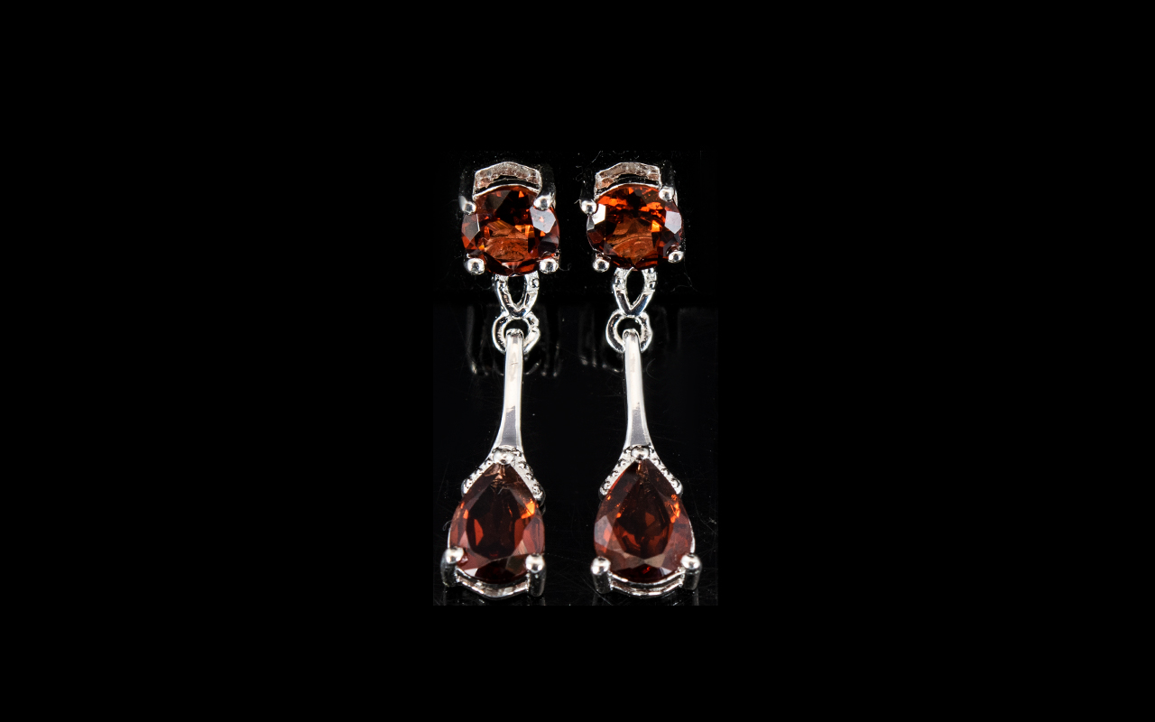 Red Garnet Drop Earrings, a pear cut red