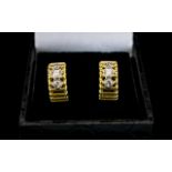 A Pair Of 18ct Gold And Diamond Set Earr