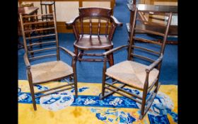 A Pair Of Lancashire Ladder back Chairs