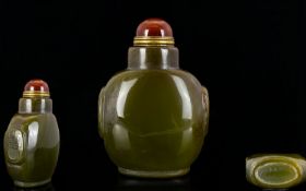 Oriental Agate Snuff Bottle Hardstone bottle of typical form with carnelian cabochon to top and