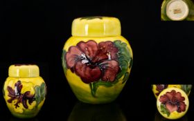 Moorcroft Attractive Tube lIne Lidded Preserve Pot Anemone Hibiscus design on yellow ground c1970